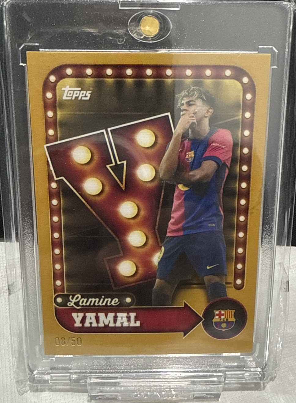 25/26 Topps FC Barcelona Collector Tin #25 Lamine Yamal Name In Lights Gold /50
