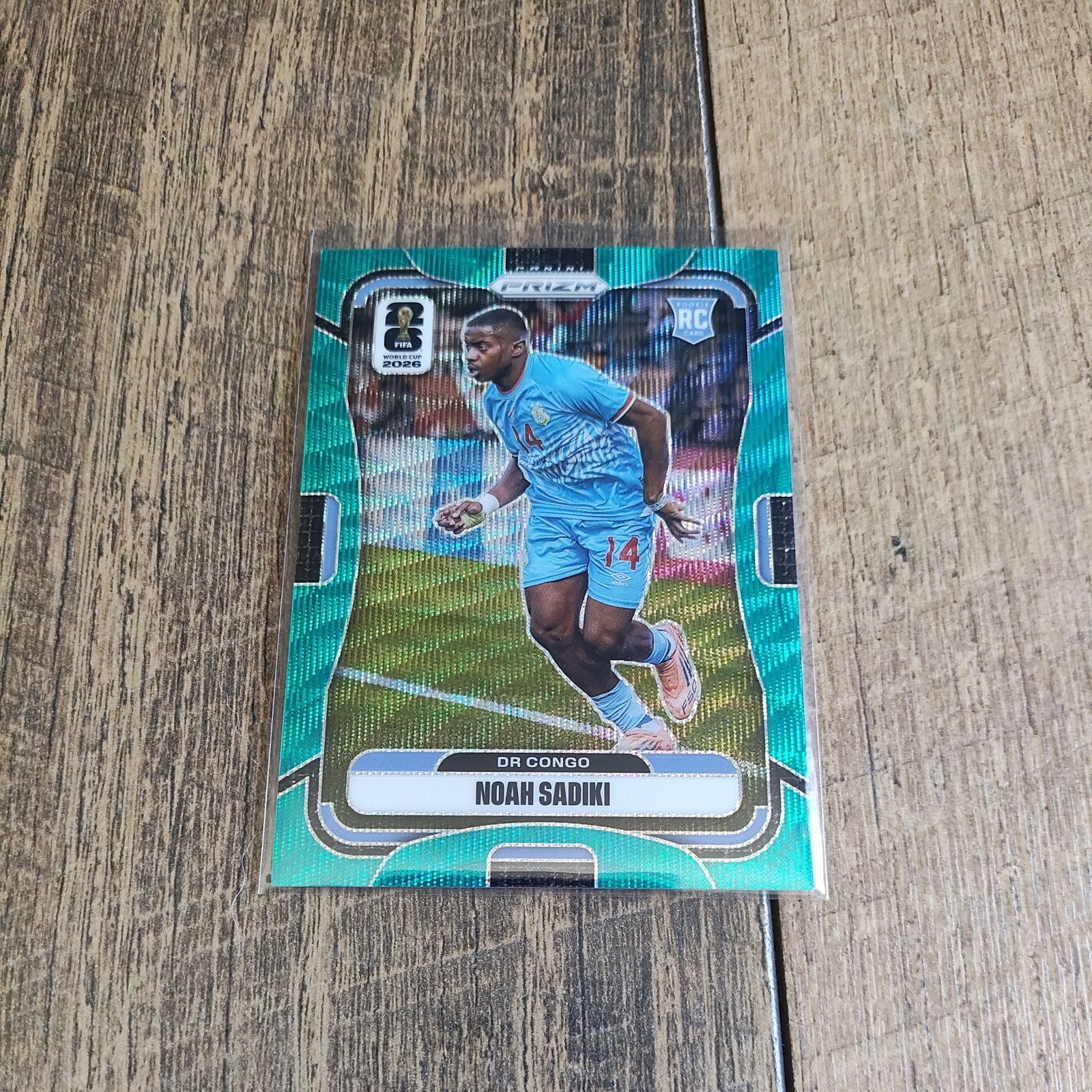 2026 Panini Prizm FIFA World Cup #462 Noah Sadiki RC DR Congo Aqua Teal Wave /99