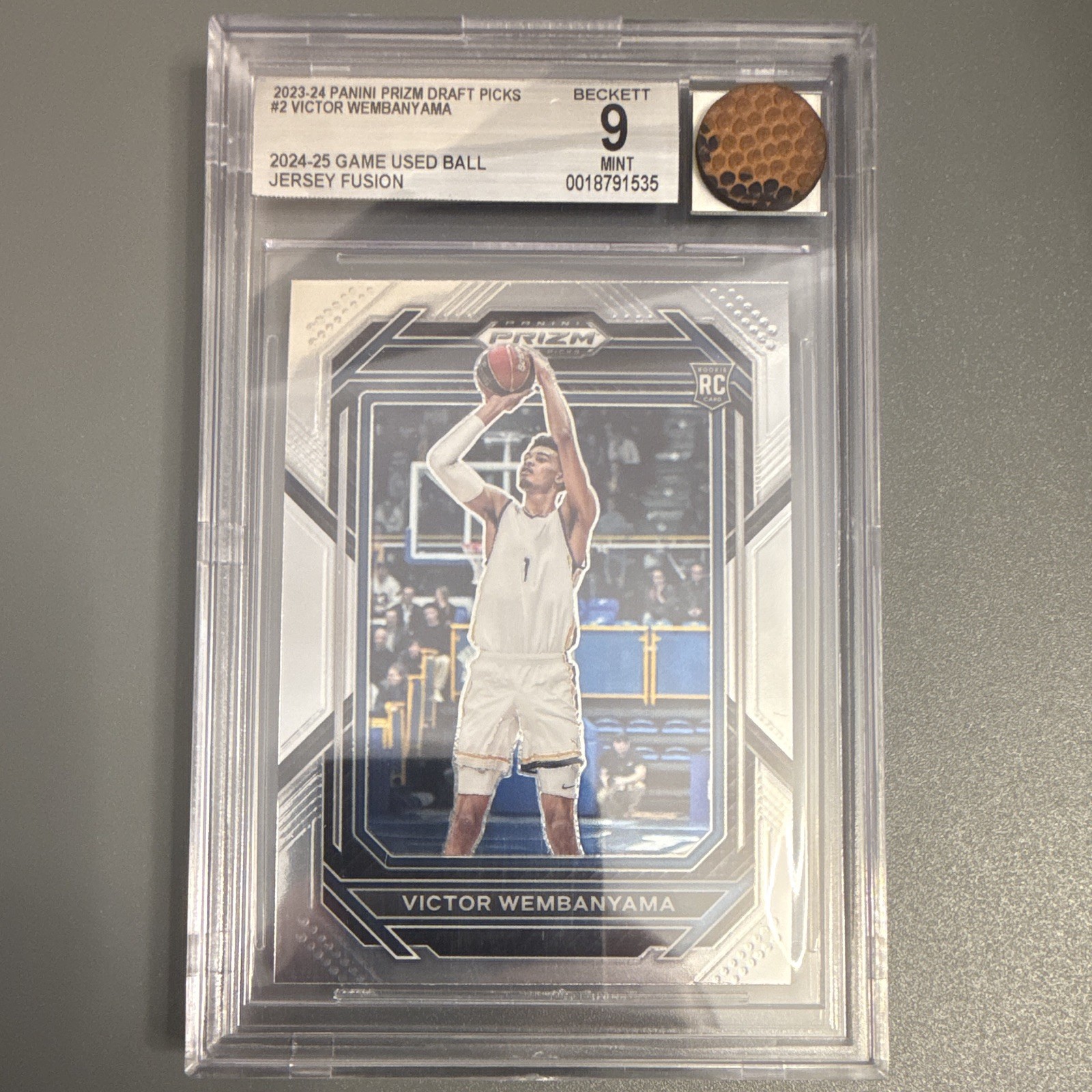 2023-24 Panini Prizm Draft Picks Victor Wembanyama RC Game Used Ball Spurs BGS 9