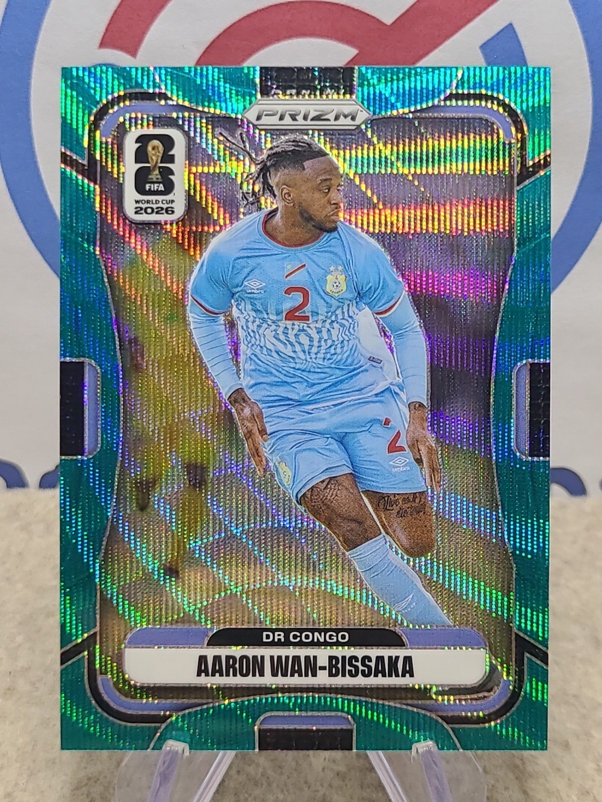 2026 Panini Prizm FIFA World Cup #461 Aaron Wan-Bissaka Teal Wave /99 DR Congo